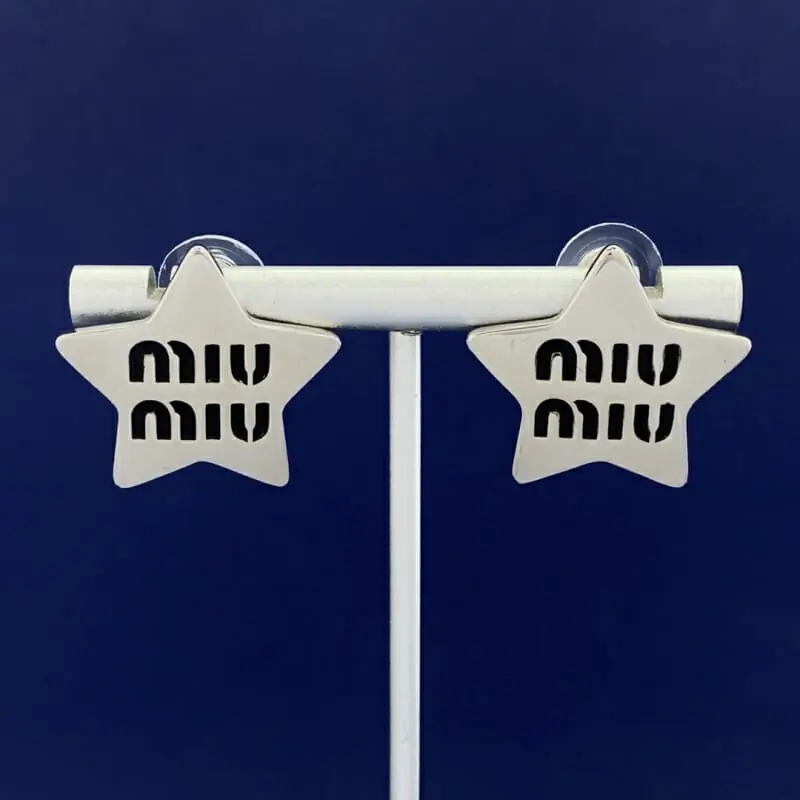 miu miu boucles doreilles pour femme s_1215257